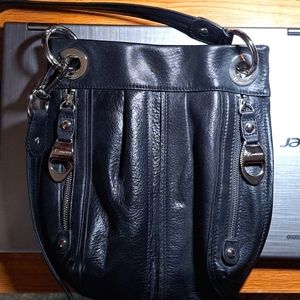 B. Makowsky black leather small bag.